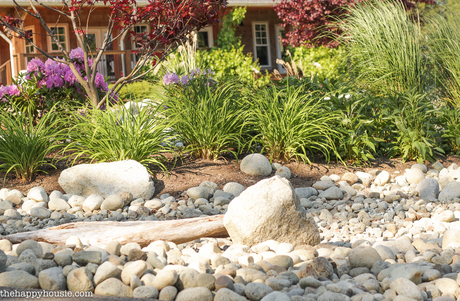Landscaping With River Rock Dry River Rock Garden Ideas The Happy Housie
